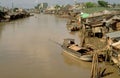 Vietnam: Slums at the dirty side arm of the Mekong River in My T