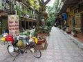 vietnam street with bicycle in the foreground Royalty Free Stock Photo