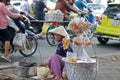 Vietnam street vendor selling snack