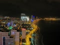 Many buildings at night in Vietnam.