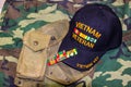 Vietnam Veteran Hat, Ribbons & Weathered Pouches Royalty Free Stock Photo