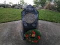 Vietnam veterans memorial with wreath and grass