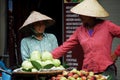 Vietnam woman people push bicycle cart hawker on road sale guava fruits to vietnamese people and foreign travelers on Hang Buom