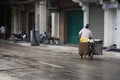 Vietnam woman people riding bicycle cart hawker on road sale local food goods to vietnamese people and foreign travelers on Hang