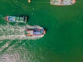 Vietnamese boats on the river. River pollution Royalty Free Stock Photo