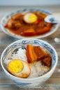 Vietnamese braised pork in coconut water with rice for lunch