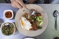 Vietnamese broken rice with grilled pork chop, fried egg and meatloaf Royalty Free Stock Photo