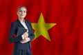 Vietnamese businesswoman on the flag of Vietnamese digital nomad, business, startup concept