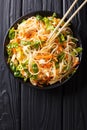 Vietnamese chicken salad with rice noodles, carrots and herbs ma