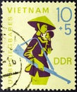Vietnamese with child in vintage stamp
