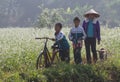 Vietnamese children going to school by bicycle Royalty Free Stock Photo