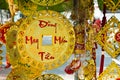 Vietnamese and Chinese New Year decorations red and gold colors on a street. The inscription is translated - Lucky Money Series.