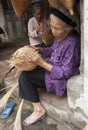 Vietnamese craftsmen making bamboo handicraft products