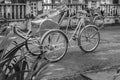 Ho Chi Minh City, Vietnam - September 1, 2018: Vietnamese cyclos and the shape of an undefined man in the back taking a break whil