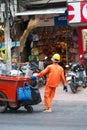 Vietnamese dustman at work