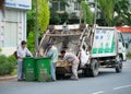 Vietnamese dustmen at work Royalty Free Stock Photo