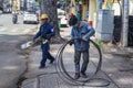 Vietnamese electrical networks. Electrical wires on poles in Hanoi. A technician is repairing or checking the messy electrical Royalty Free Stock Photo