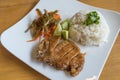 Vietnamese famous gastronomy- pork chop broken rice served with vegetables Royalty Free Stock Photo