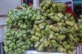 Vietnamese Fermented Pork Roll and cylindrical sticky rice cake are displayed on the street in Dam market, Nha Trang City