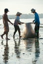 Vietnamese fishers pack nets