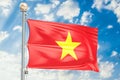 Vietnamese flag waving in blue cloudy sky, 3D rendering