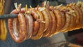 Vietnamese food: grilled pig pudding, circles baked on fire Royalty Free Stock Photo