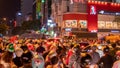 Vietnamese football fans celebrate winning of Asian Cup. Football fan waving national flag on top of a truck Royalty Free Stock Photo