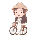 Vietnamese girl in traditional costume walking with bicycle.