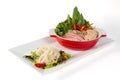 Vietnamese healthy food set PHO as white noodles with sliced pork or beef and vegetable soup