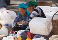 Vietnamese Hmong women selling traditional wine in canes Royalty Free Stock Photo