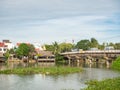 Vietnamese houses on a river, floating market and boats, traditional way of life, Hoi An town, central Vietnam Royalty Free Stock Photo
