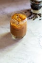 Vietnamese iced coffee brewing with sweet condensed milk in glass Royalty Free Stock Photo