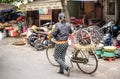 A Vietnamese man brings chickens in cages on bicycles and sells them on the streets of Hanoi. Vietnam