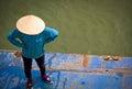 Vietnamese man on deck of barge