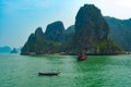 Motorboat and tourist boat, Halong Bay Royalty Free Stock Photo