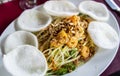 Vietnamese Mango salad with shrimps, sesame seeds and rice cracker Royalty Free Stock Photo