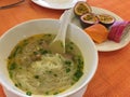 Vietnamese noodle soup, sprinkled with herb
