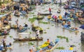 Vietnamese people on boat at Nga Nam floating market in the morning