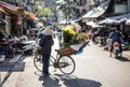 Vietnamese people often use cargo bikes to sell their goods on the streets of Hanoi, Vietnam.