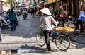 Vietnamese people often use cargo bikes to sell their goods on the streets of Hanoi Royalty Free Stock Photo