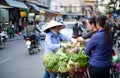 Vietnamese people sell vegetable milk on the streets of Hanoi.