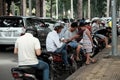 Vietnamese play pokemon go on motorbike