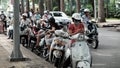 Vietnamese play pokemon go on motorbike