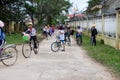 Vietnamese pupil ride bike from school