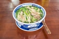 Vietnamese Rice Noodle Pho Bo Bowl and Chopsticks Royalty Free Stock Photo
