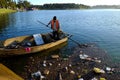 Vietnamese sanitation worker, rubbish, water, pollution Royalty Free Stock Photo
