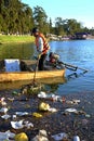 Vietnamese sanitation worker, rubbish, water, pollution Royalty Free Stock Photo