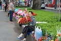 Vietnamese street vendor, flower outdoor market