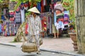 Vietnamese street vendor in Hoi An Royalty Free Stock Photo