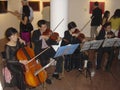 Vietnamese string quartet musicians play song Royalty Free Stock Photo